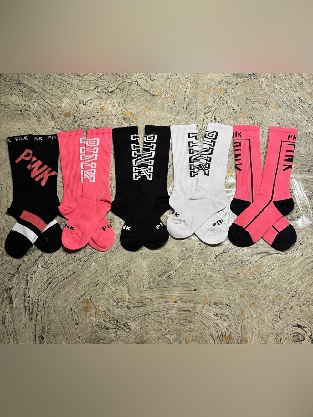 Pink Victoria’s Secret Socks
New Pink socks 
5 pairs
Size Large 6-10